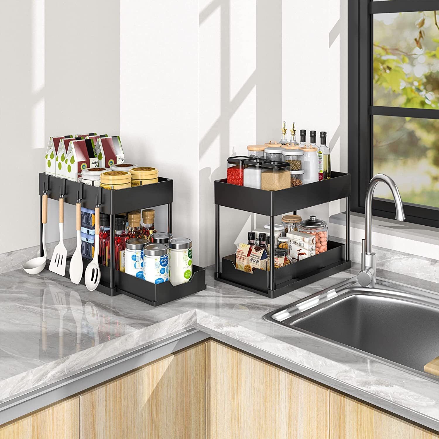 Kitchen counter with black multi-tiered organizer, utensils, and spices near a sink.