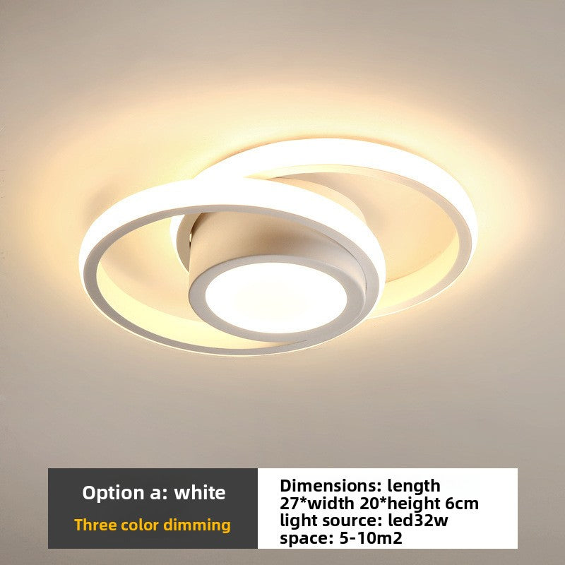 Ceiling light fixture with circular design on a neutral background