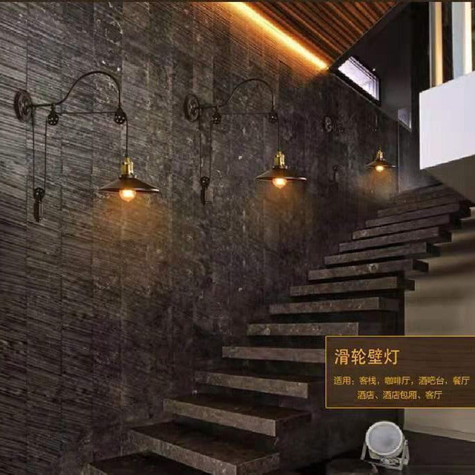 Wall-mounted lamps on a textured wall with wooden ceiling