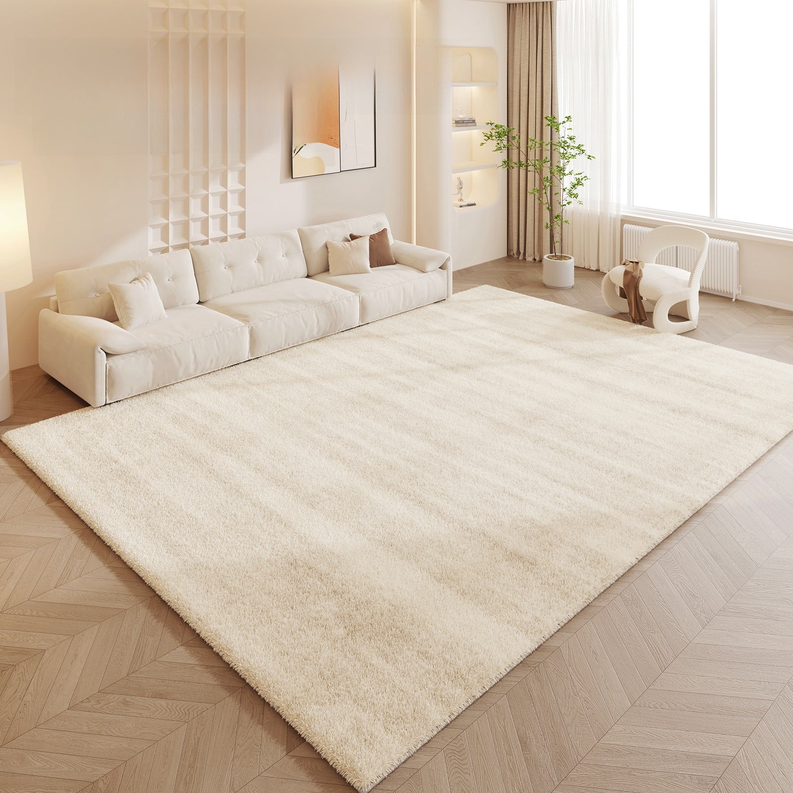 Beige rug in a living room with a white sofa and decorative elements.