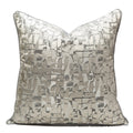 Decorative pillow with a patterned design on a white background