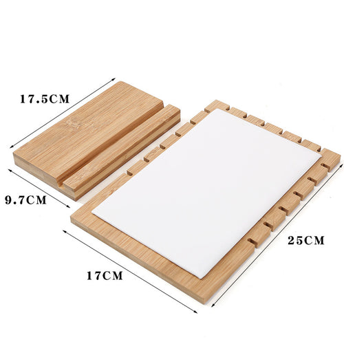 Wooden cutting board with measurements on a white background