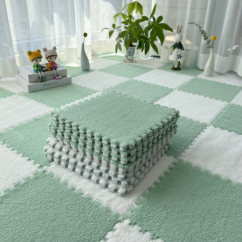 Green and white foam puzzle mat in a room with toys and plants