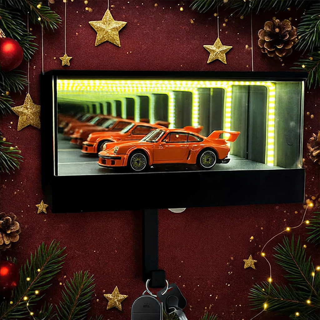 Orange car displayed in a decorative setting with Christmas elements