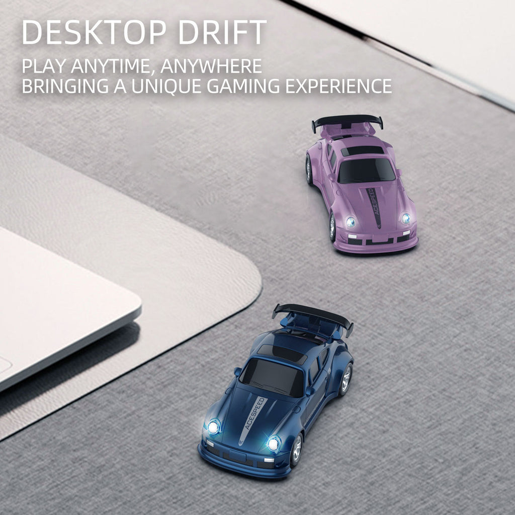 Two toy cars on a desk with text about gaming experience