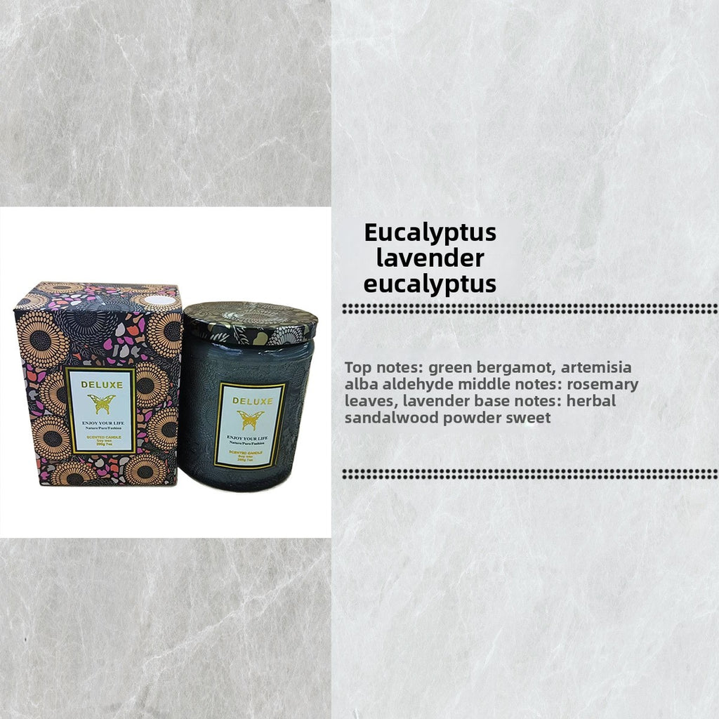 Candle with packaging and eucalyptus lavender eucalyptus description on a textured gray background