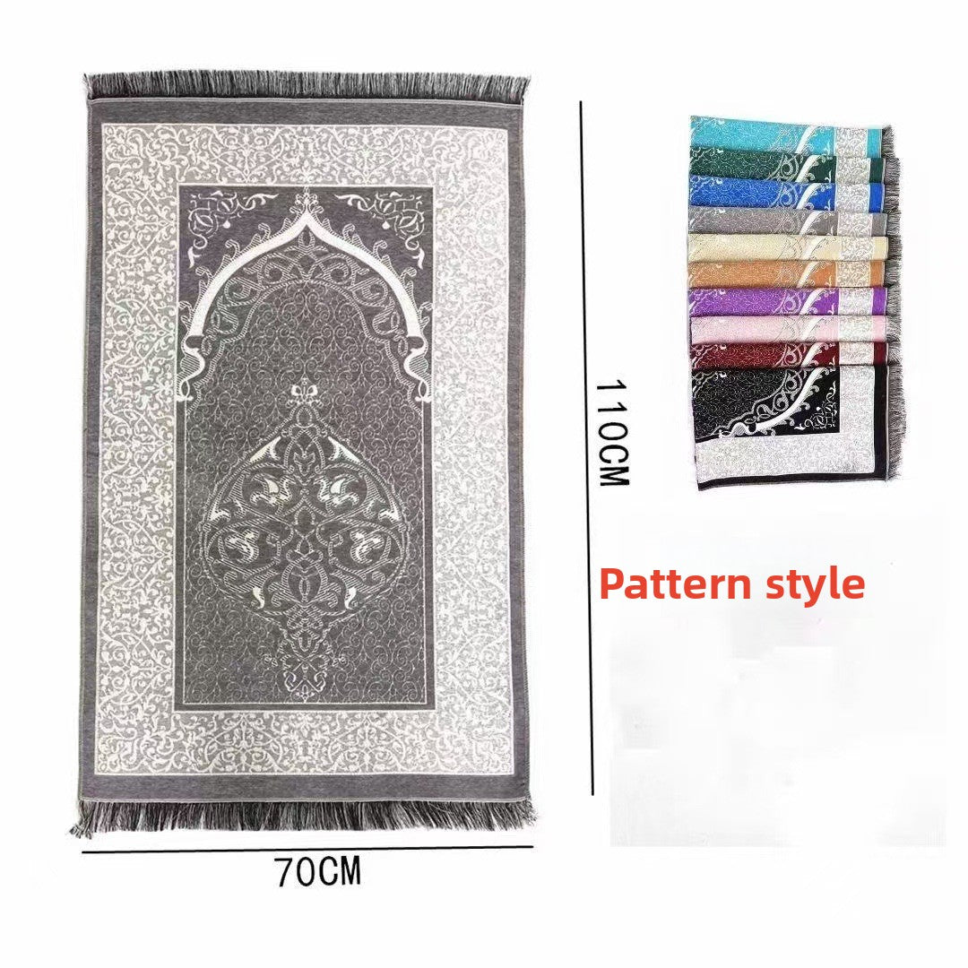 Gray prayer mat with intricate design and dimensions on a white background