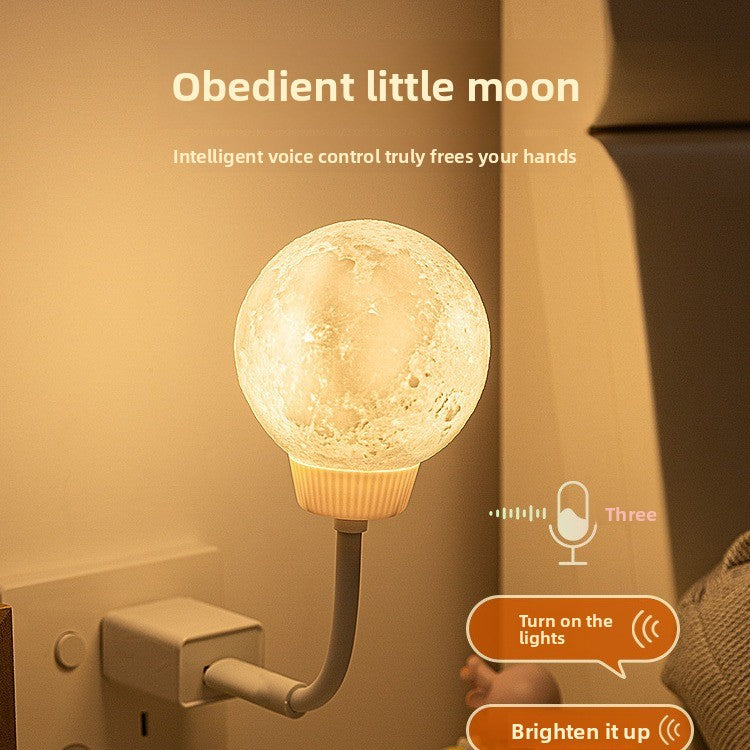 Wall-mounted light bulb with moon design and voice control features on a beige wall.