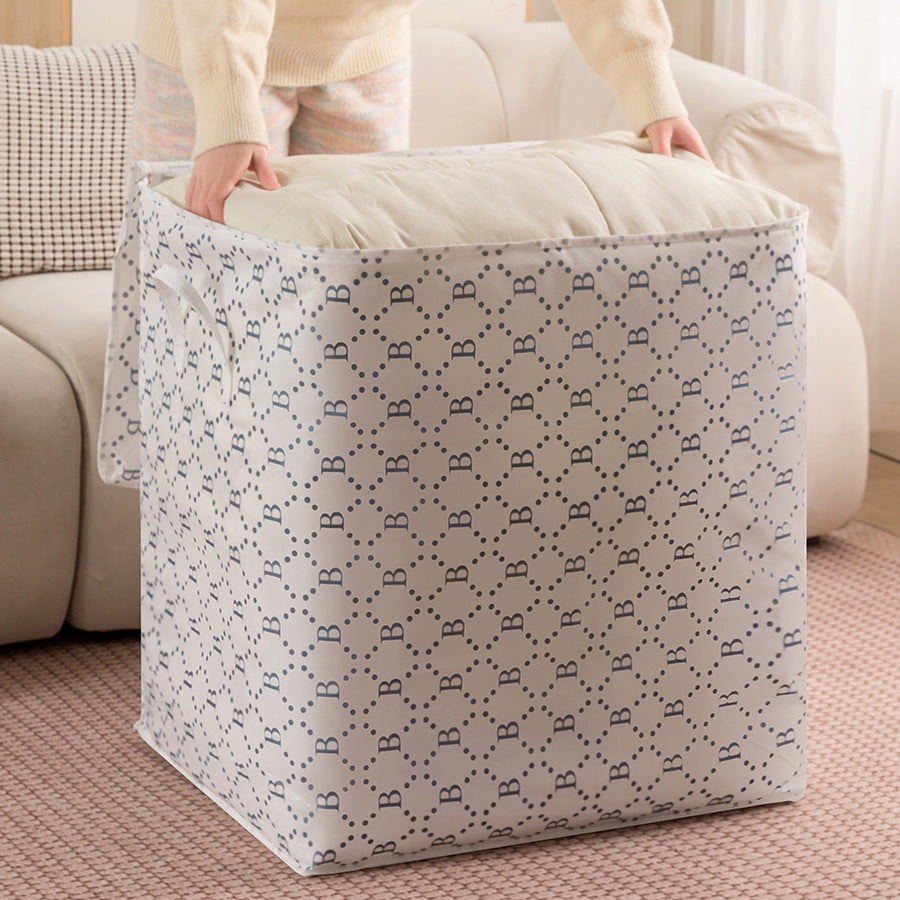 Person holding a patterned storage bin in a living room setting
