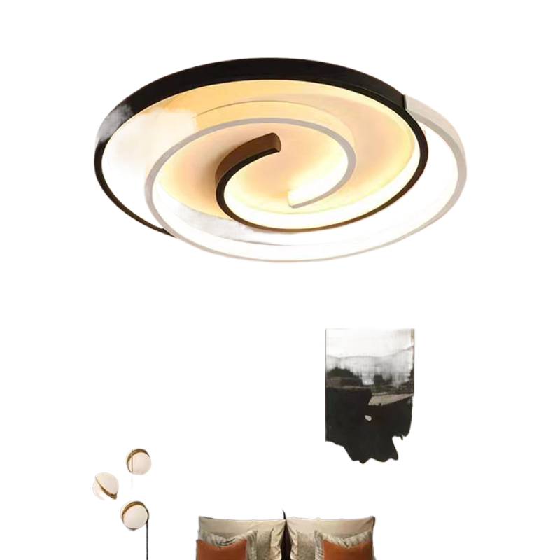 Modern ceiling light fixture with a white and black design on a white background