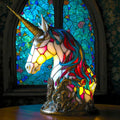 Colorful unicorn lamp with stained glass window in the background
