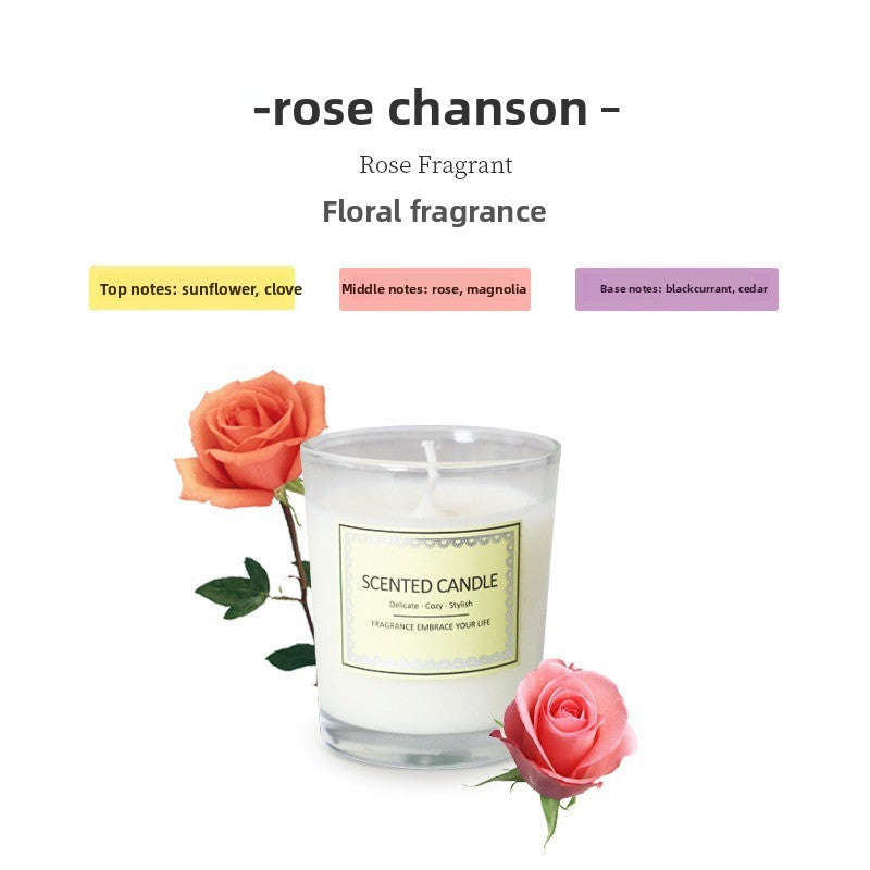 Scented candle with floral fragrance and rose chanson branding on a white background
