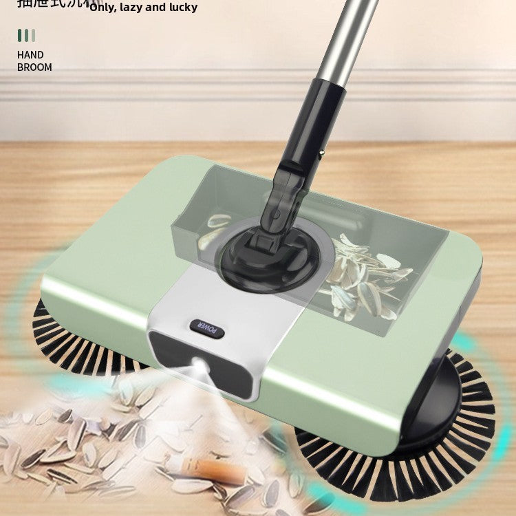Green handheld vacuum cleaner cleaning a wooden floor with debris.
