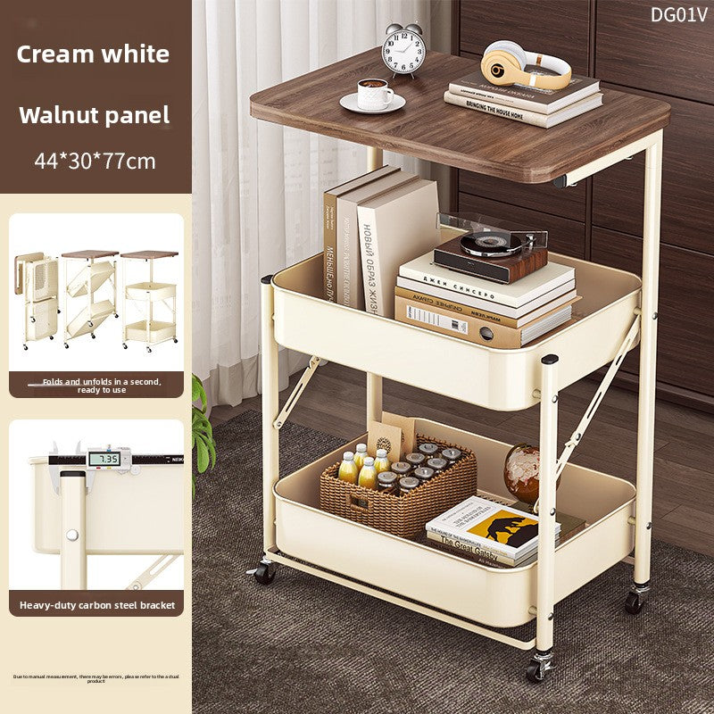 Multi-purpose cart with wooden top and cream base, featuring books and a clock.