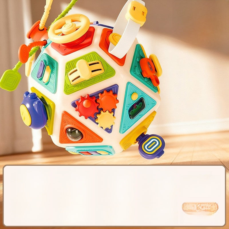 Colorful baby toy with various shapes on a wooden base