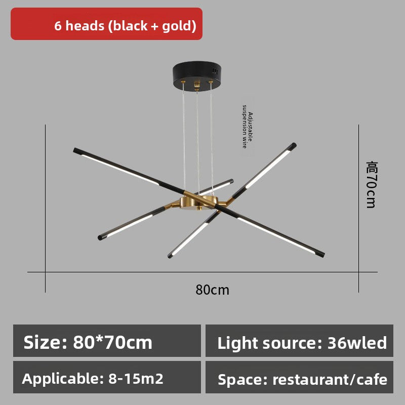 Chandelier with black and gold design on a gray background, showing dimensions and features.