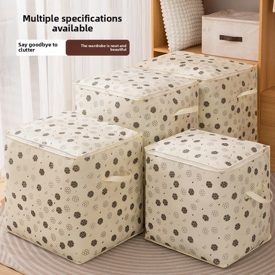 Set of floral-patterned storage boxes on a wooden shelf.