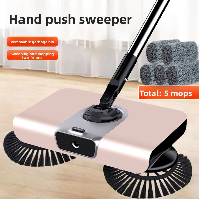 Hand push sweeper with removable garbage bin on a wooden floor background