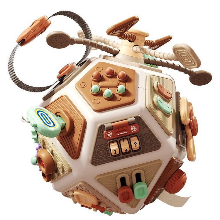 Colorful toy cube with various textured and shaped sides on a white background