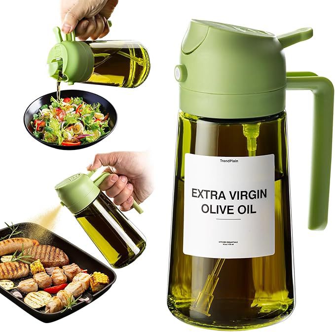 Green olive oil bottle with a label, being used to drizzle on food.
