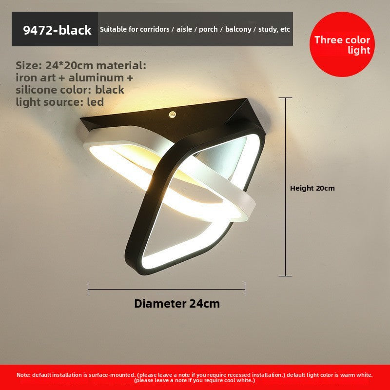 Wall-mounted light fixture with dimensions and material details on a gray background