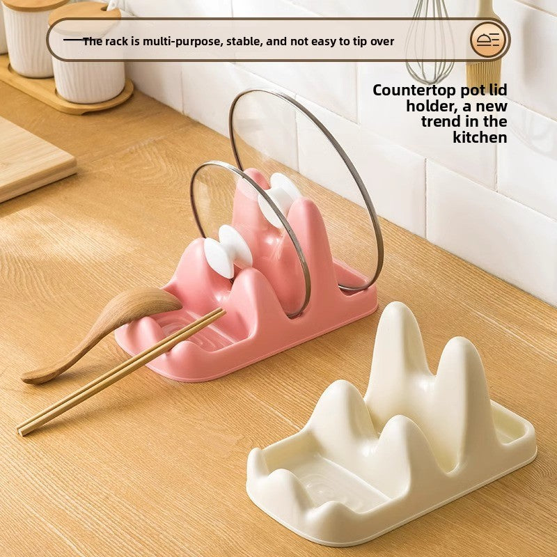 Pink and white countertop pot lid holders on a wooden surface with text describing their features.