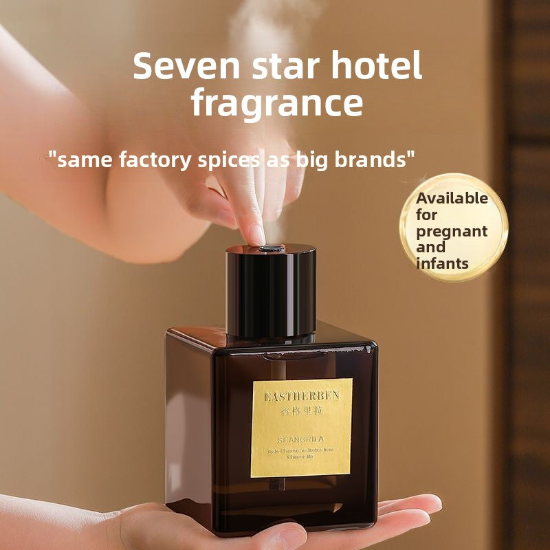 Perfume bottle with 'Seven star hotel fragrance' text and branding details.