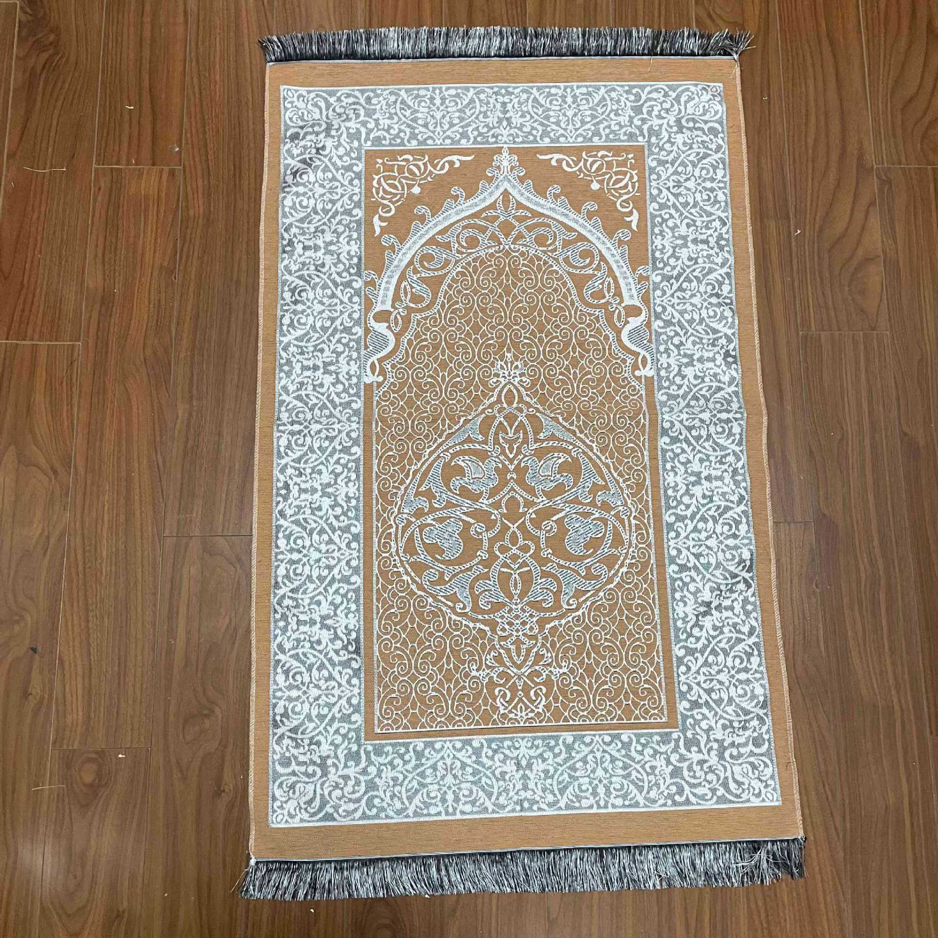Decorative rug with intricate patterns on a wooden floor