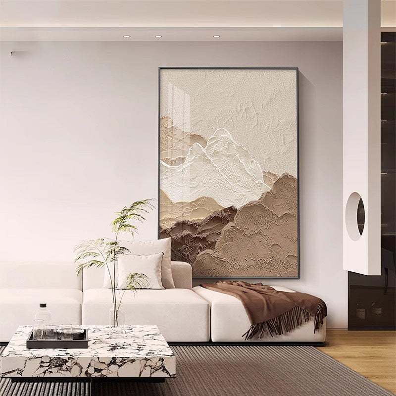 Modern living room with abstract mountain artwork on the wall
