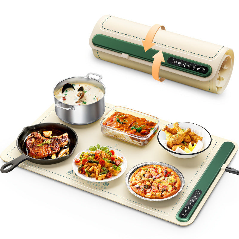 Portable electric heating mat with various dishes on a white background
