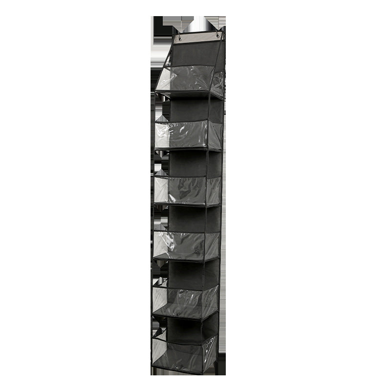 Black hanging shoe organizer with multiple compartments on a white background