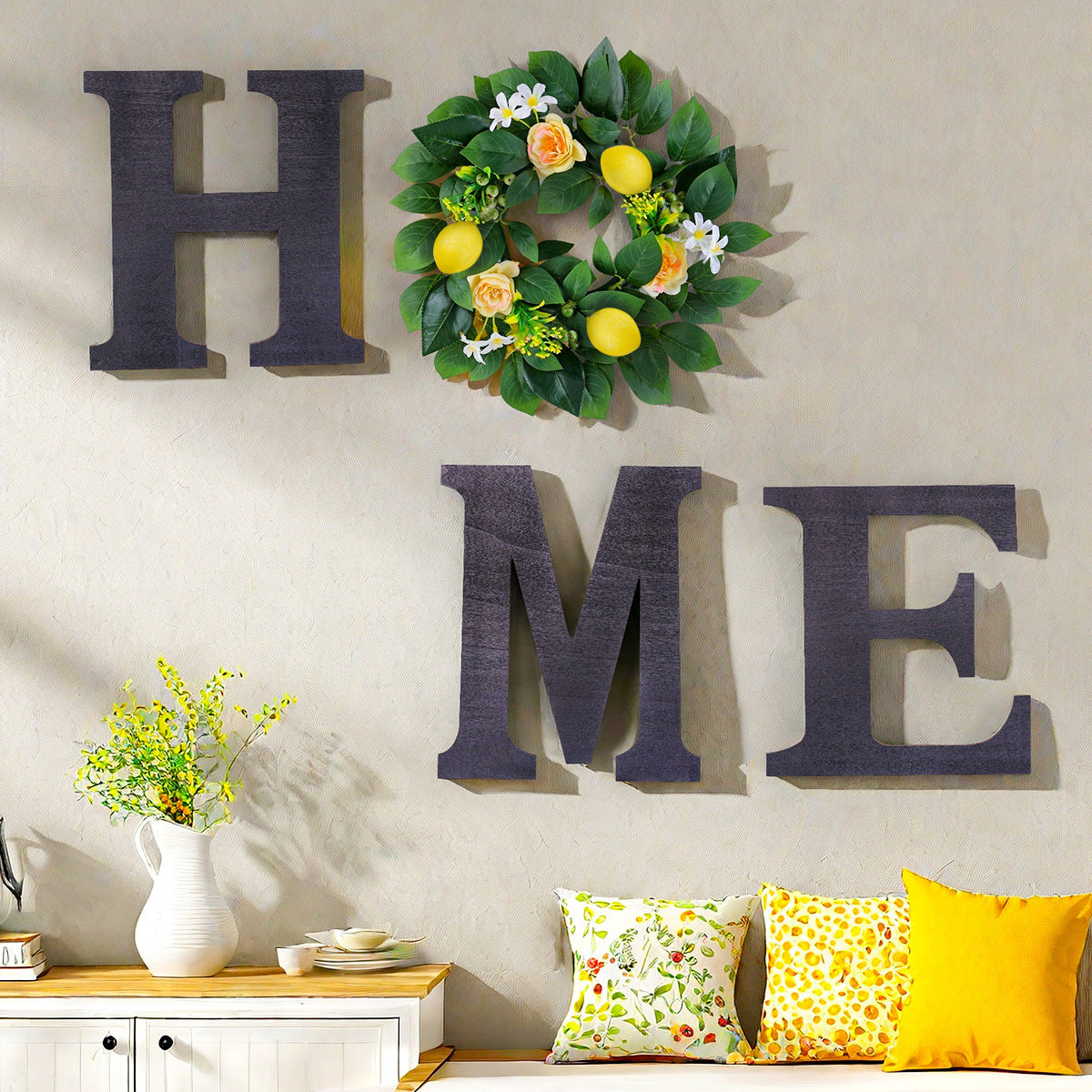 Decorative wall art with 'HOME' letters and a floral wreath on a light beige wall.