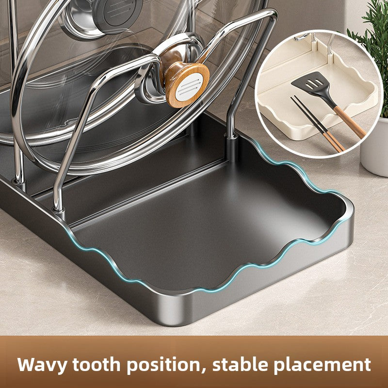 Stainless steel pot holder with wavy design on a kitchen counter