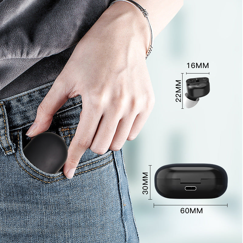 Black wireless earbuds being placed in a pocket with size measurements displayed.